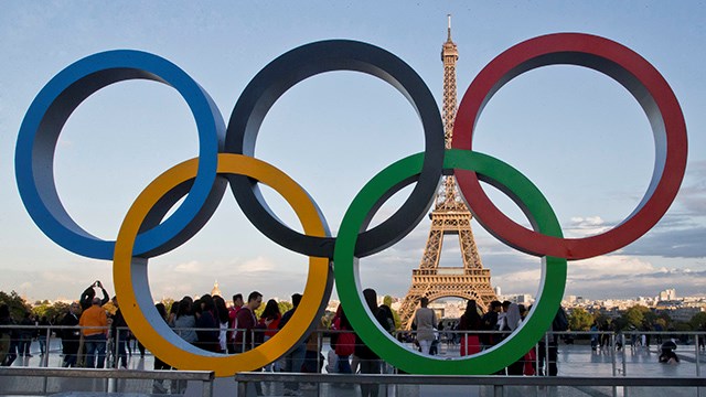 FILE - The Olympic rings are set up at Trocadero plaza that overlooks the Eiffel Tower in Paris on Sept. 14, 2017. The United States and China are expected to finish 1-2 in the gold and the overall medal counts at the Paris Olympics, which open in 100 days. (AP Photo/Michel Euler, File)