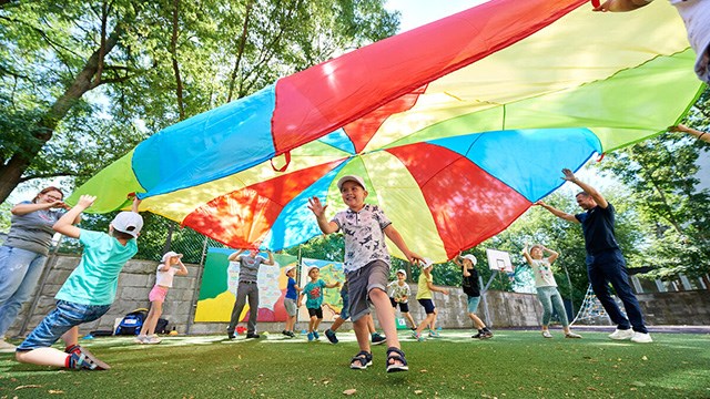 Ukrainian football legend  Andriy Shevchenko called for more mental health support for young refugees on July 25, 2022 in Warsaw.

He visited a summer school in Warsaw that is helping children from Ukraine catch-up on missed learning and play. Since the war escalated five months ago, at least 5.8 million refugees from Ukraine have been recorded across Europe, half of whom are estimated to be children with many having no access to education for weeks.

Save the Children’s summer schools for children from Ukraine in Poland are providing a safe haven where young refugees can boost their education and mental health and psychosocial wellbeing. 
(Photo by Adam Nurkiewicz/Getty Images)