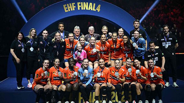 Odense's players pose with their silver medals after the EHF FINAL4 Women 2025 Champions League final handball match between Gyori Audi ETO KC (HUN) and Odense Handbold (DEN) on June 1, 2025 in Budapest, Hungary. (Photo by Attila KISBENEDEK / AFP)
